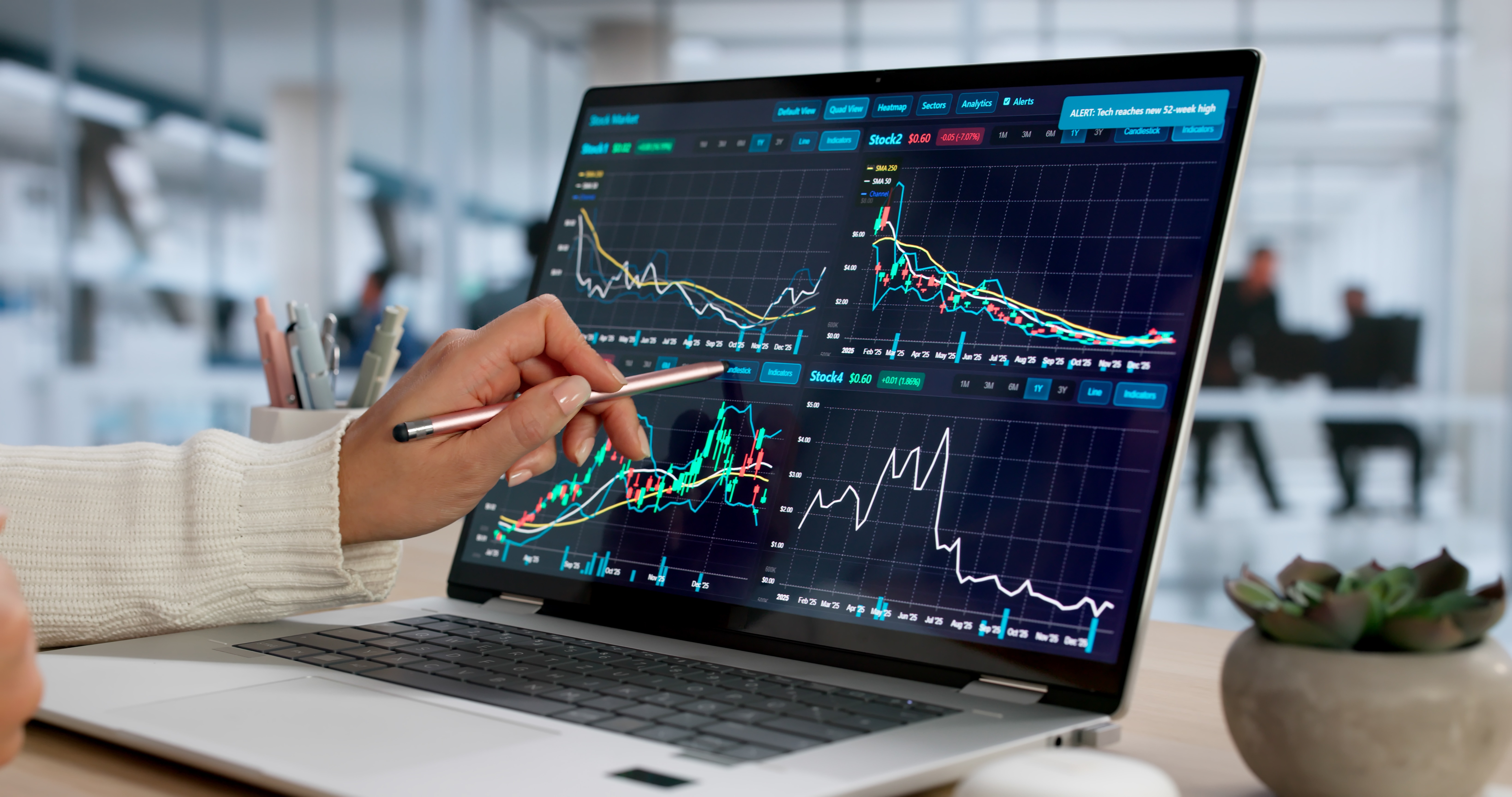 Imagem de portatil com graficos de trading